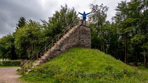 A hiker at the highest point of Belgium Signal de Botrange